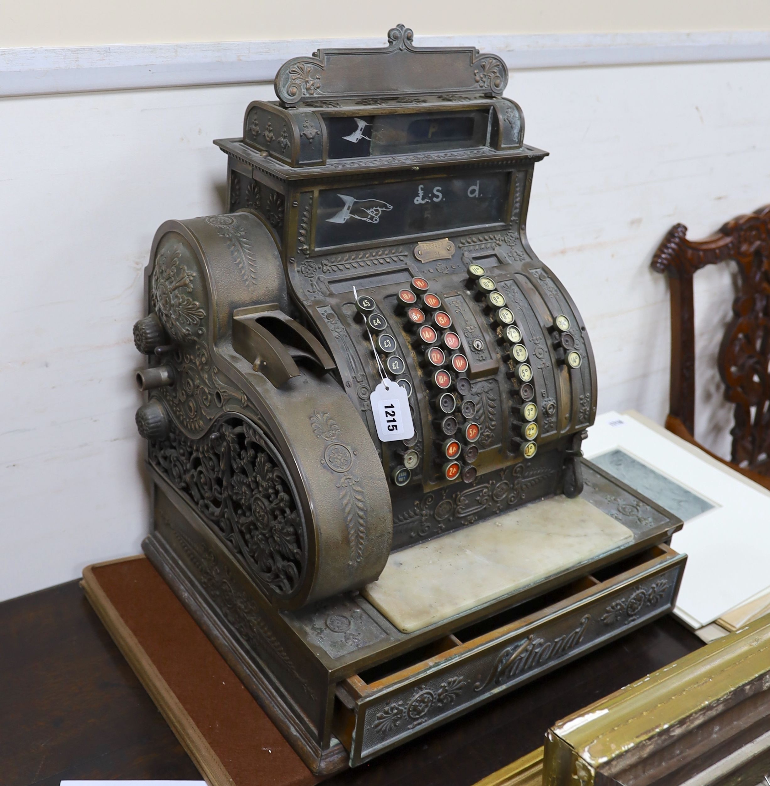 An early 20th century American National cash register, Serial Number 1068452/484, width 47cm, depth 39cm, height 57cm